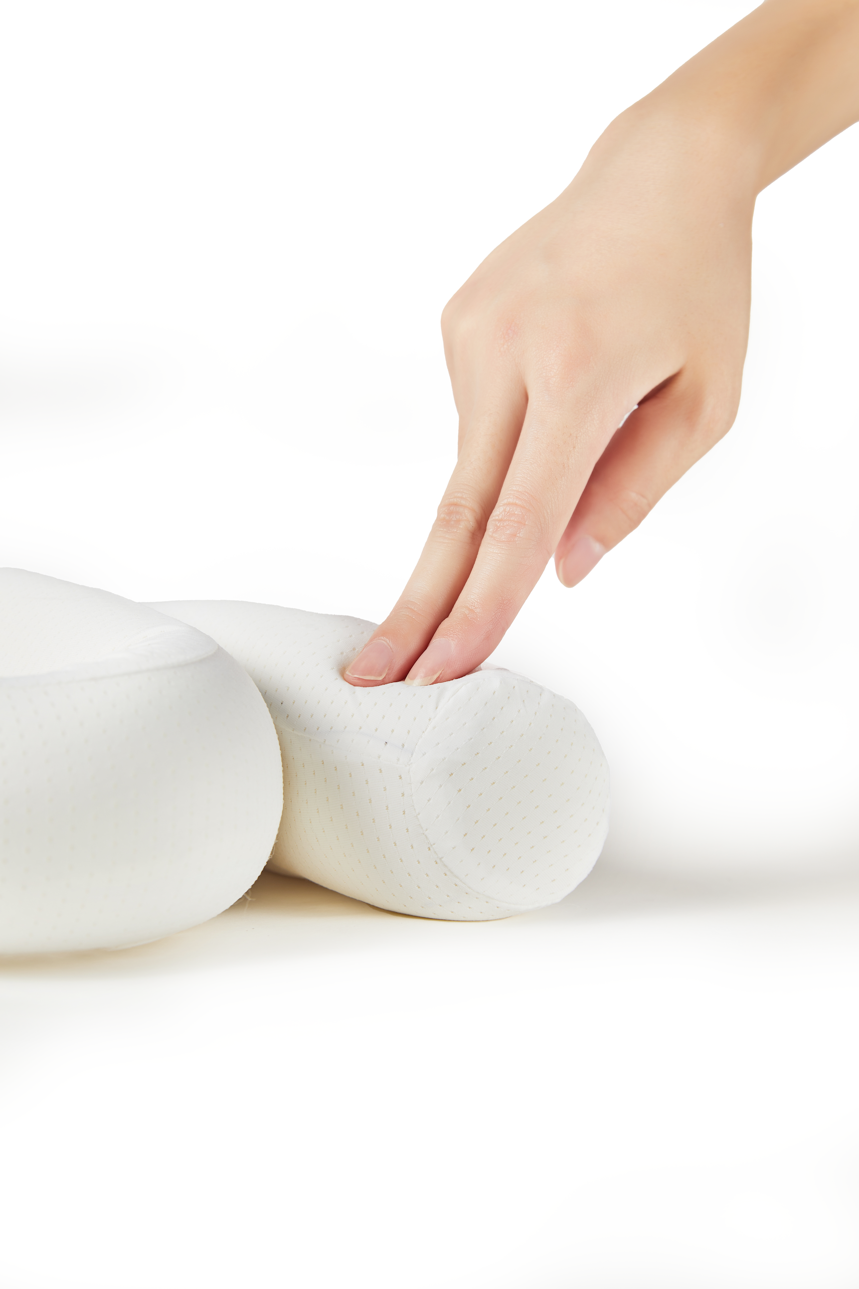 Finger pressing into supportive foam